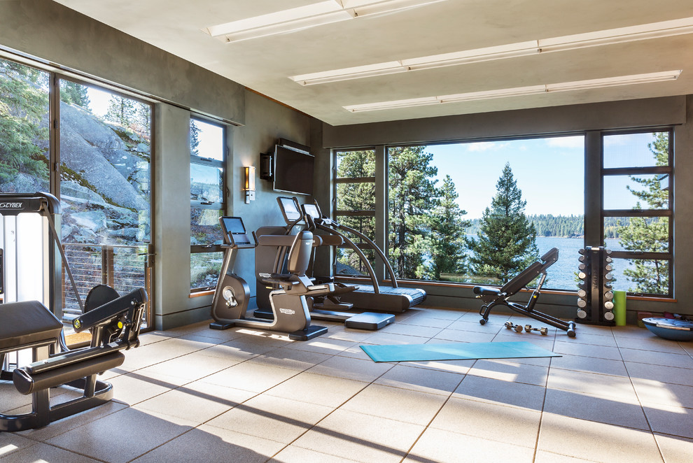 Photo of a modern home gym in Boise with blue walls.