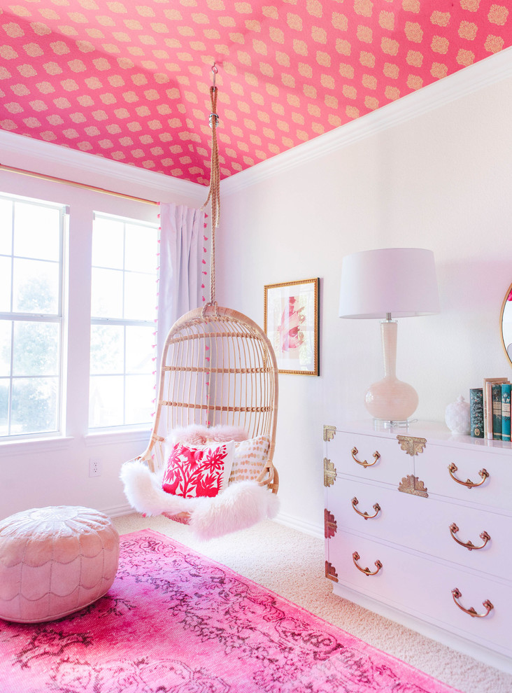 Girls Bedroom Design Dallas – Pink Ceiling & Hanging Chair | Lark Interiors - Girls bedroom design in a Dallas home featuring a statement pink patterned ceiling, a hanging rattan chair, and layered textiles, creating a playful yet polished space with personality and charm.