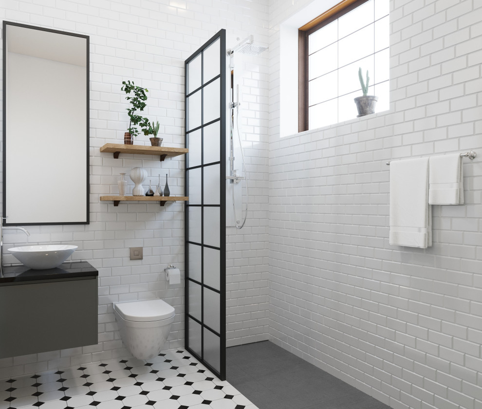 Идея дизайна: ванная комната среднего размера в стиле ретро с плоскими фасадами, черными фасадами, открытым душем, унитазом-моноблоком, белой плиткой, плиткой кабанчик, белыми стенами, полом из керамогранита, душевой кабиной, накладной раковиной, столешницей из гранита, белым полом, открытым душем, черной столешницей, тумбой под одну раковину, подвесной тумбой и кирпичными стенами