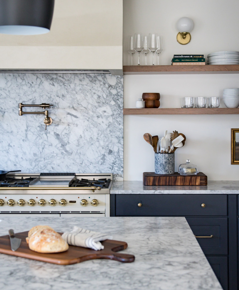 Example of a transitional kitchen design in Denver
