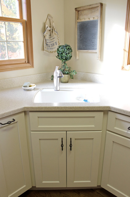 Cream Laundry Room With Corian Countertop Medina Oh