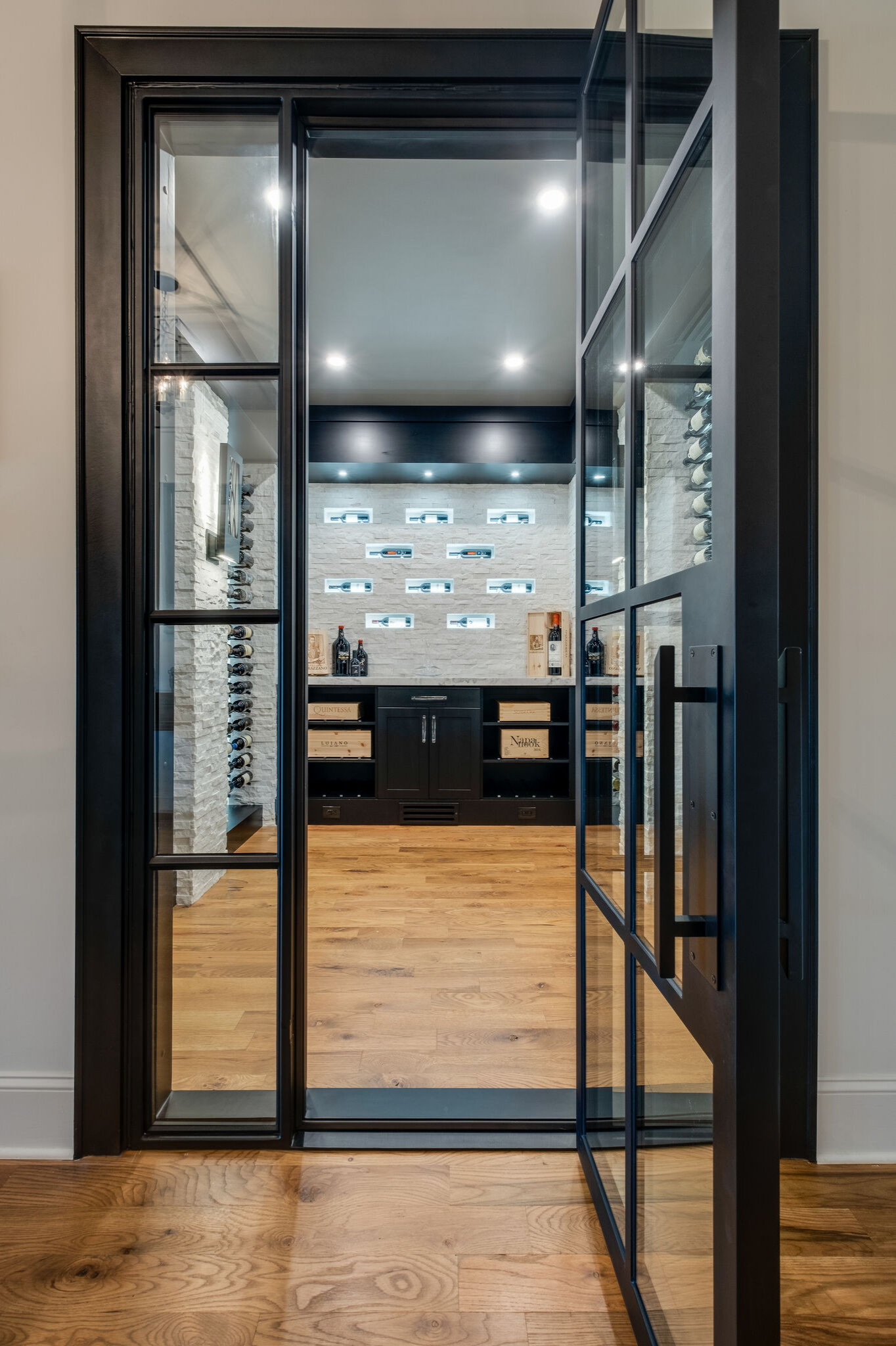 Unique, clean line refrigerated, modern wine room