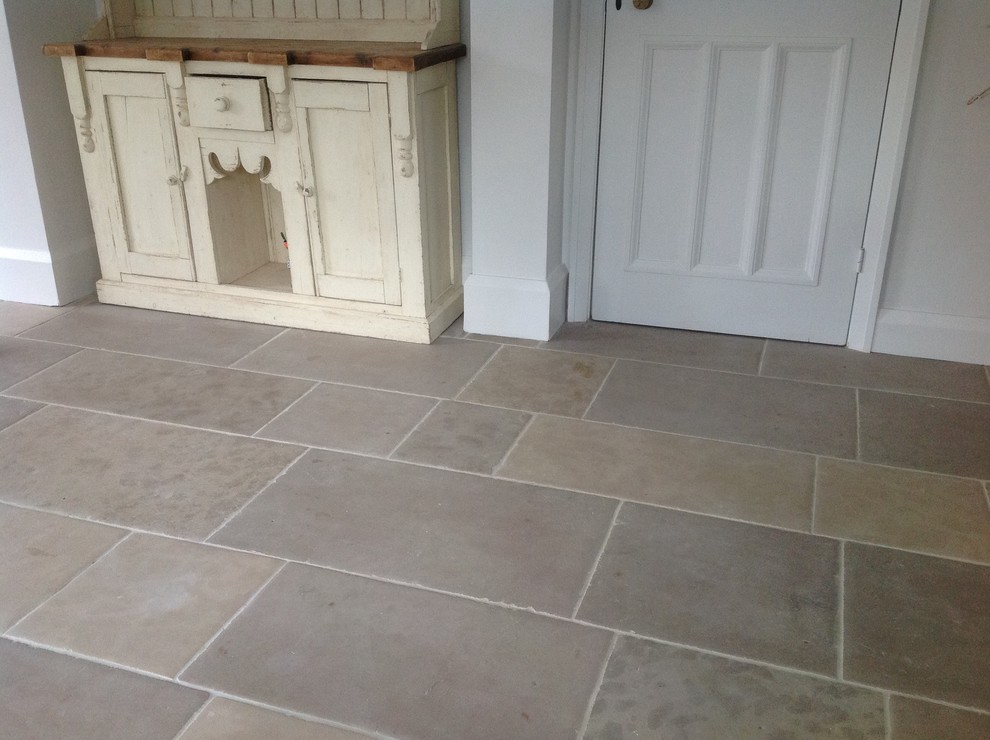 Design ideas for a country kitchen in Berkshire with limestone floors.