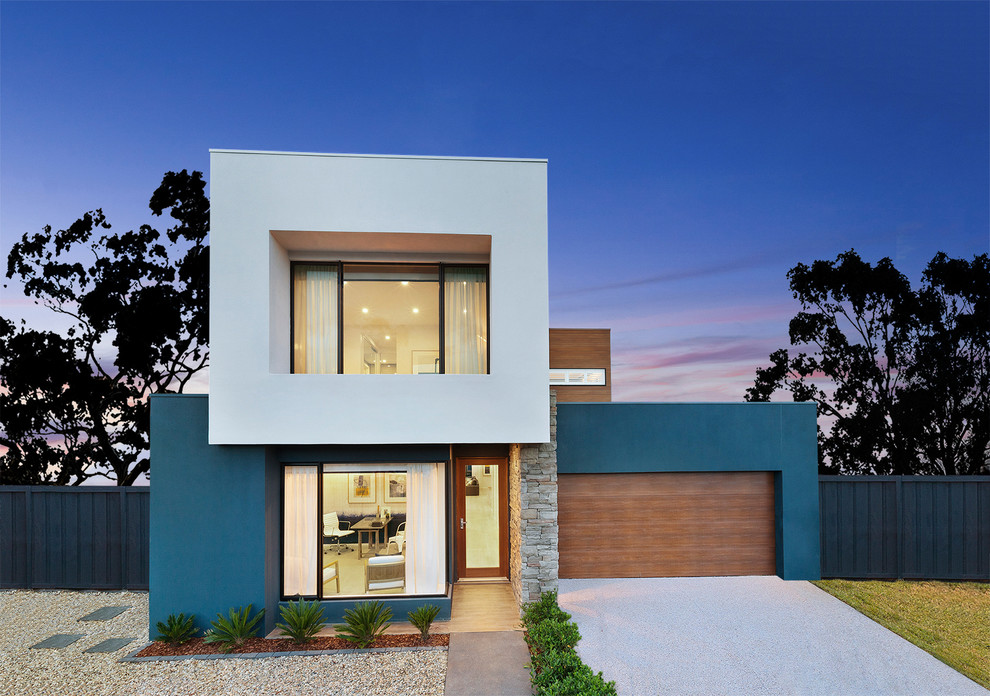 This is an example of a contemporary two-storey exterior in Sydney with a flat roof.