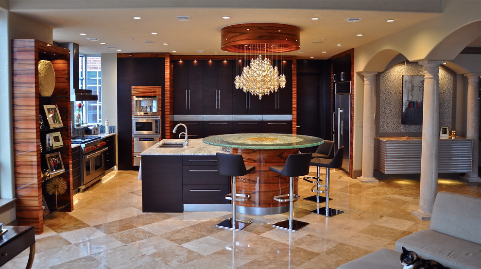 This is an example of a large contemporary l-shaped eat-in kitchen in Dallas with an undermount sink, flat-panel cabinets, dark wood cabinets, marble benchtops, grey splashback, porcelain splashback, stainless steel appliances, marble floors and with island.