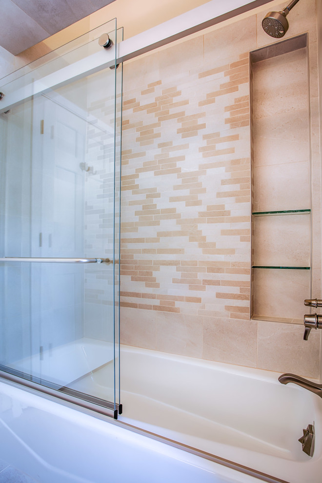 Alcove bathtub - small transitional beige tile and porcelain tile porcelain tile and beige floor alcove bathtub idea in Phoenix with flat-panel cabinets, medium tone wood cabinets, a one-piece toilet, beige walls, a vessel sink and granite countertops