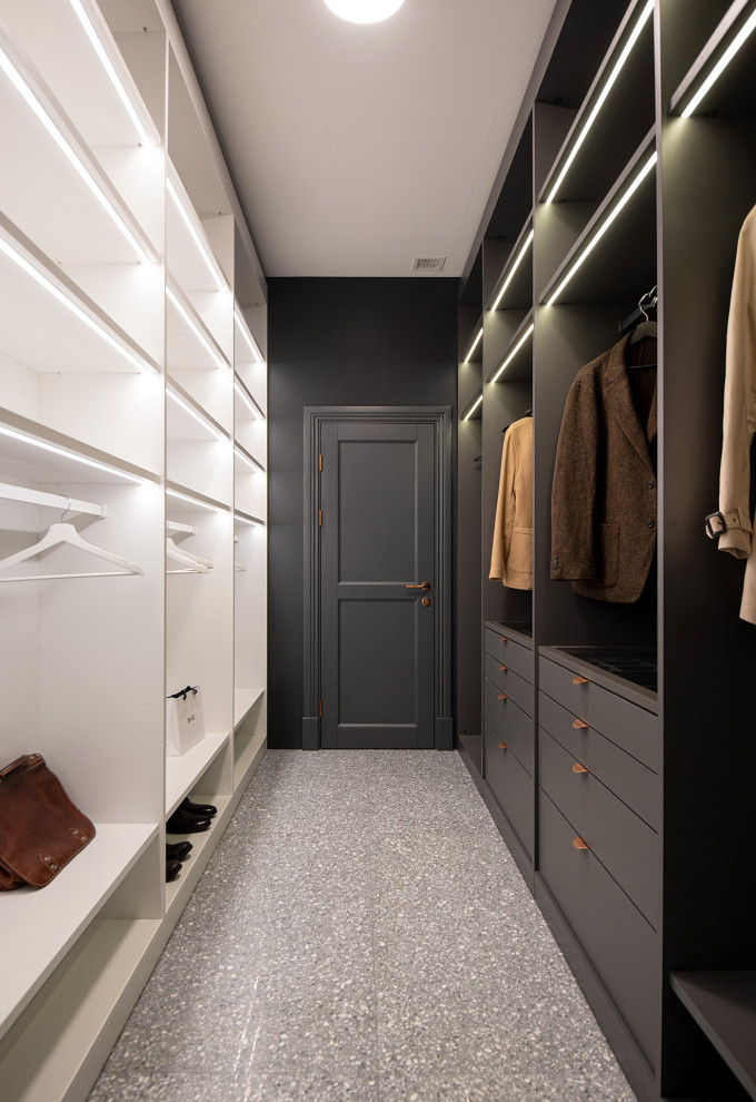 Design ideas for a mid-sized gender-neutral walk-in wardrobe in Saint Petersburg with open cabinets, grey cabinets and grey floor.
