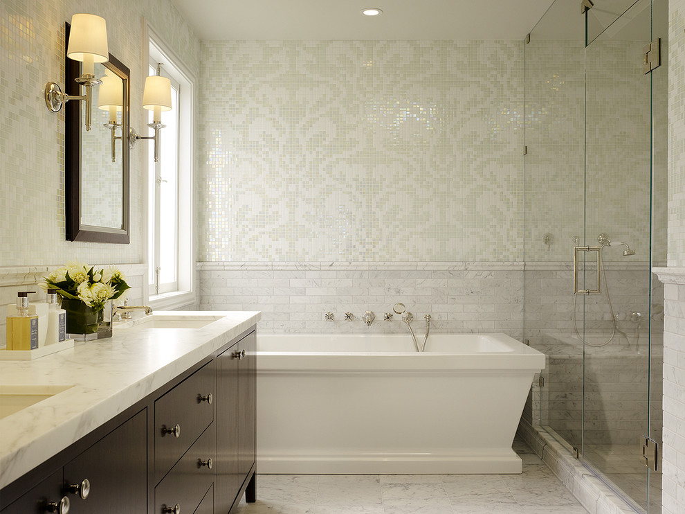 Photo of a contemporary bathroom in San Francisco with a freestanding tub and mosaic tile.