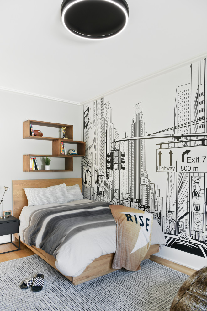 Inspiration for a mid-sized contemporary kids' room for boys in DC Metro with light hardwood floors and wallpaper.