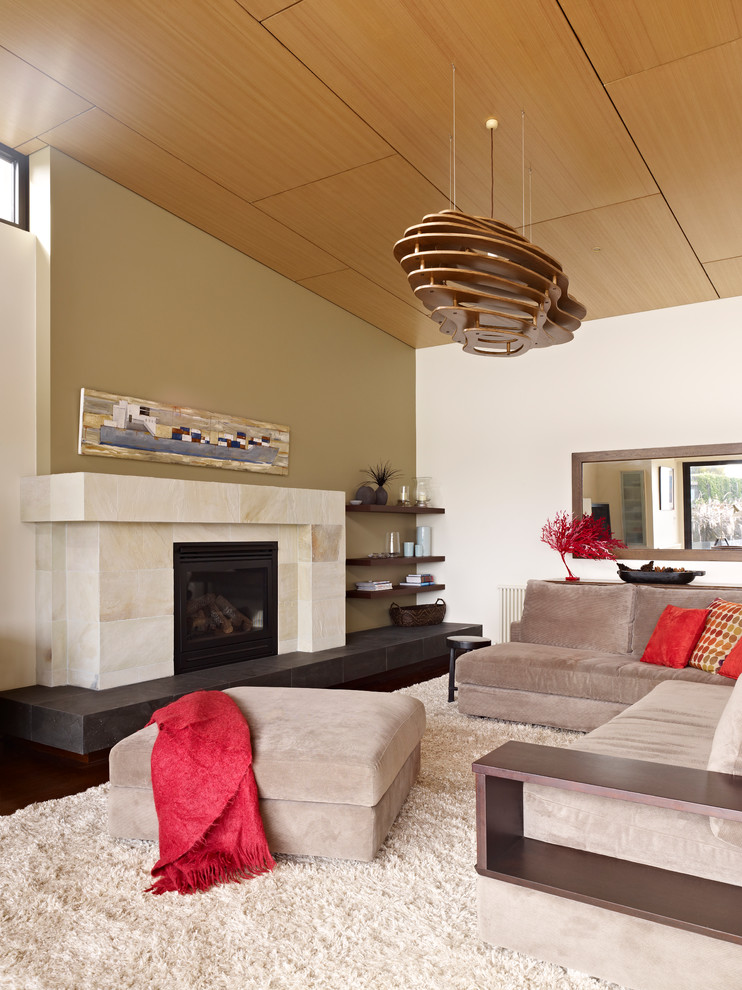 Photo of a large beach style formal open concept living room in Melbourne with beige walls, painted wood floors, a ribbon fireplace, a stone fireplace surround and no tv.