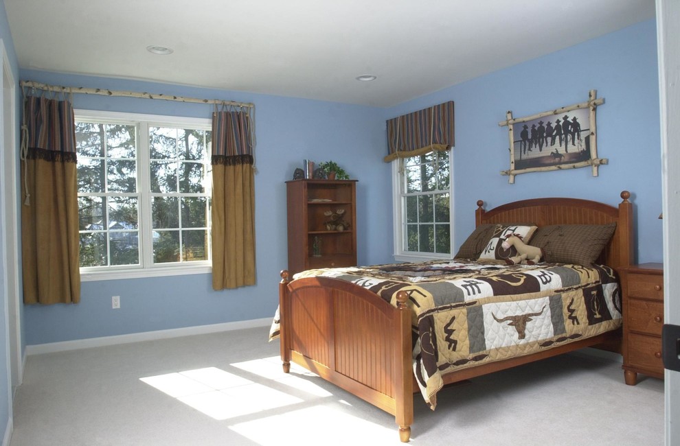 This is an example of a mid-sized country guest bedroom in New York with blue walls and carpet.