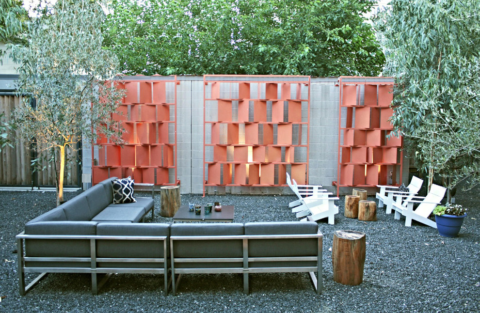 Inspiration for a large modern backyard patio in Los Angeles with gravel and no cover.