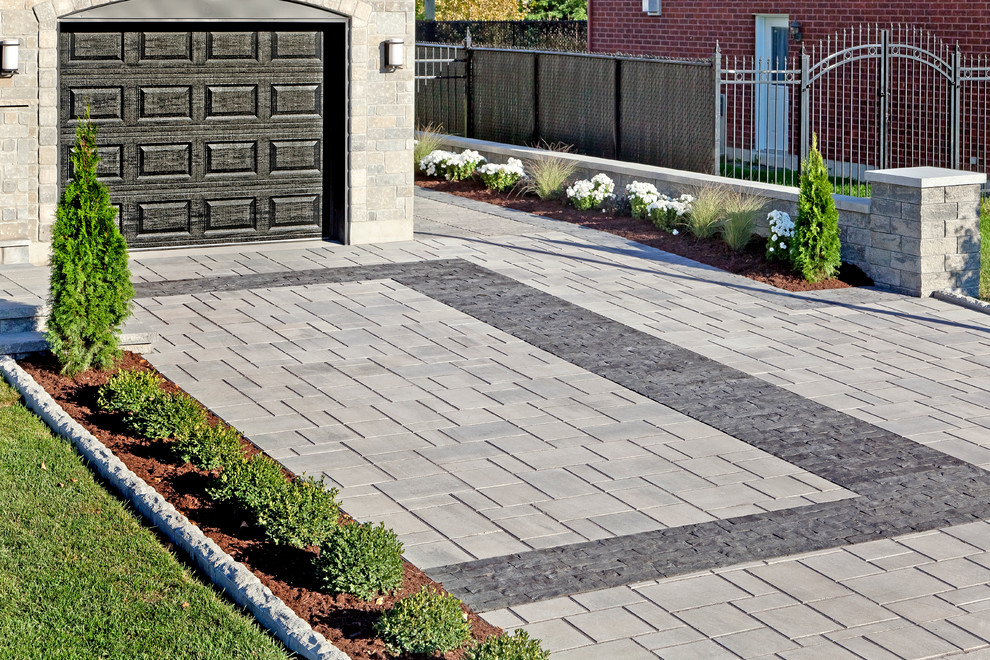 This is an example of a small contemporary front yard driveway in Other.