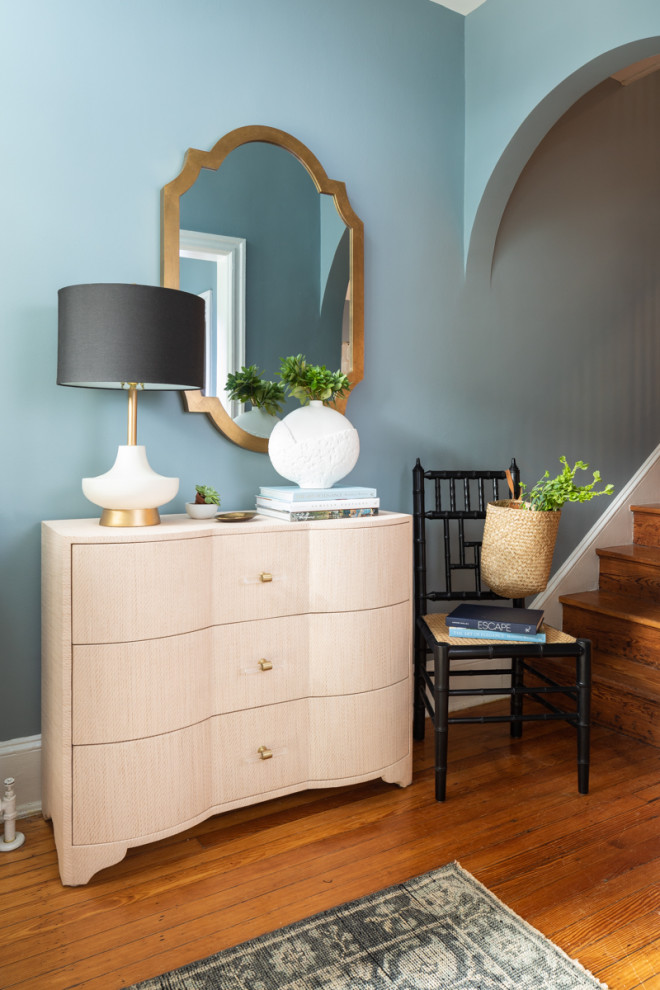 Inspiration for a small transitional foyer in Philadelphia with blue walls and medium hardwood floors.