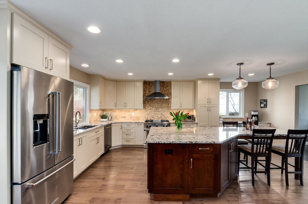 Example of a transitional kitchen design in Denver