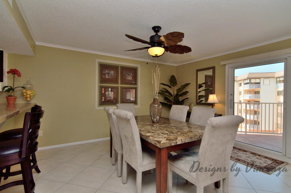 Photo of a large beach style kitchen/dining combo in Tampa with beige walls, ceramic floors and no fireplace.