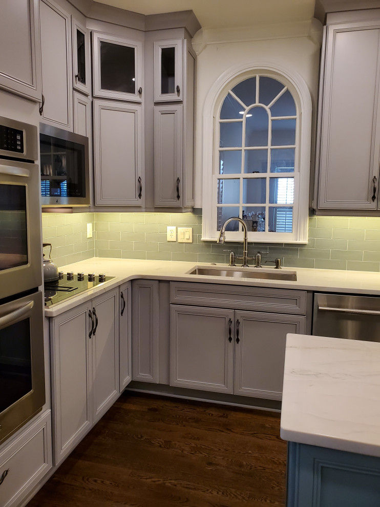 Inspiration for a transitional kitchen remodel in Atlanta with gray cabinets
