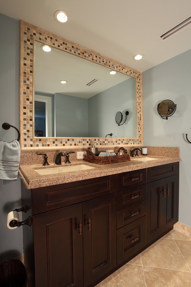 Large transitional multicolored tile and mosaic tile ceramic tile and beige floor bathroom photo in Miami with recessed-panel cabinets, dark wood cabinets, blue walls, a drop-in sink, terrazzo countertops and multicolored countertops