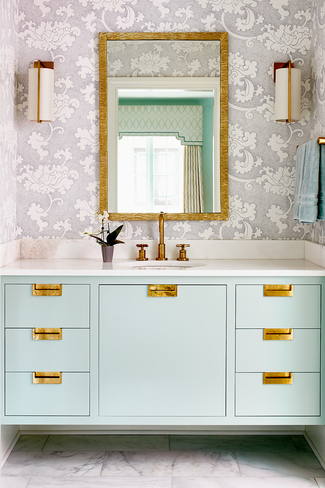 Example of a small transitional white floor bathroom design in Other with flat-panel cabinets, blue cabinets, gray walls and an undermount sink