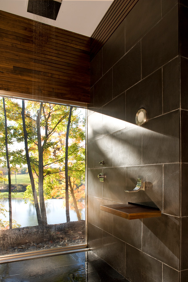 Inspiration for a modern bathroom in New York with an open shower, brown tile and an open shower.