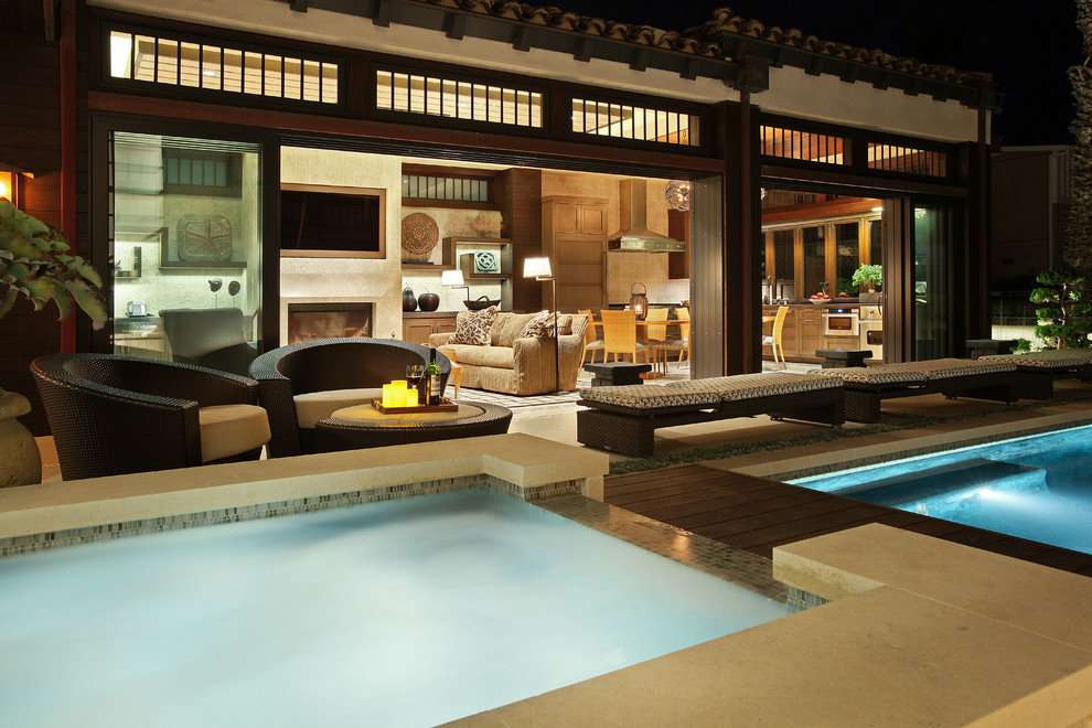 Inspiration for an expansive asian backyard patio in Orange County with tile and no cover.