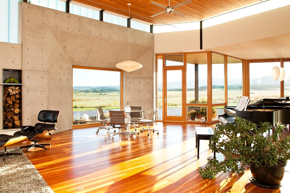 Inspiration for a large contemporary dining room in Denver with concrete floors.