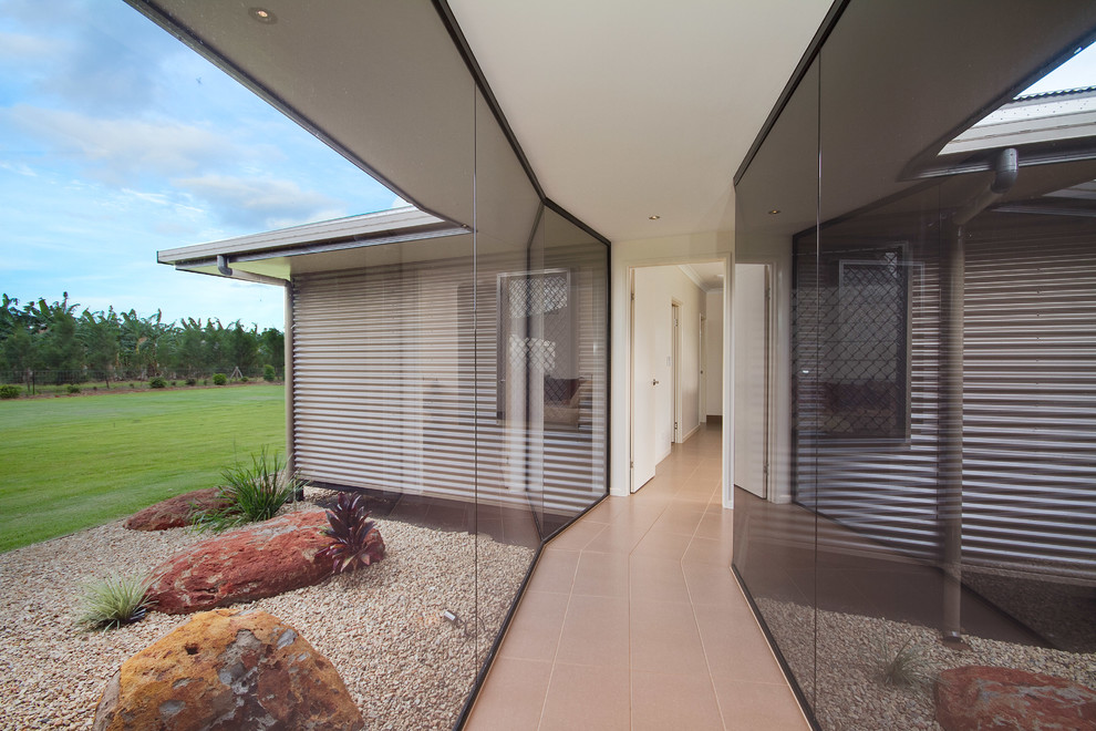 Mid-sized contemporary hallway in Cairns.