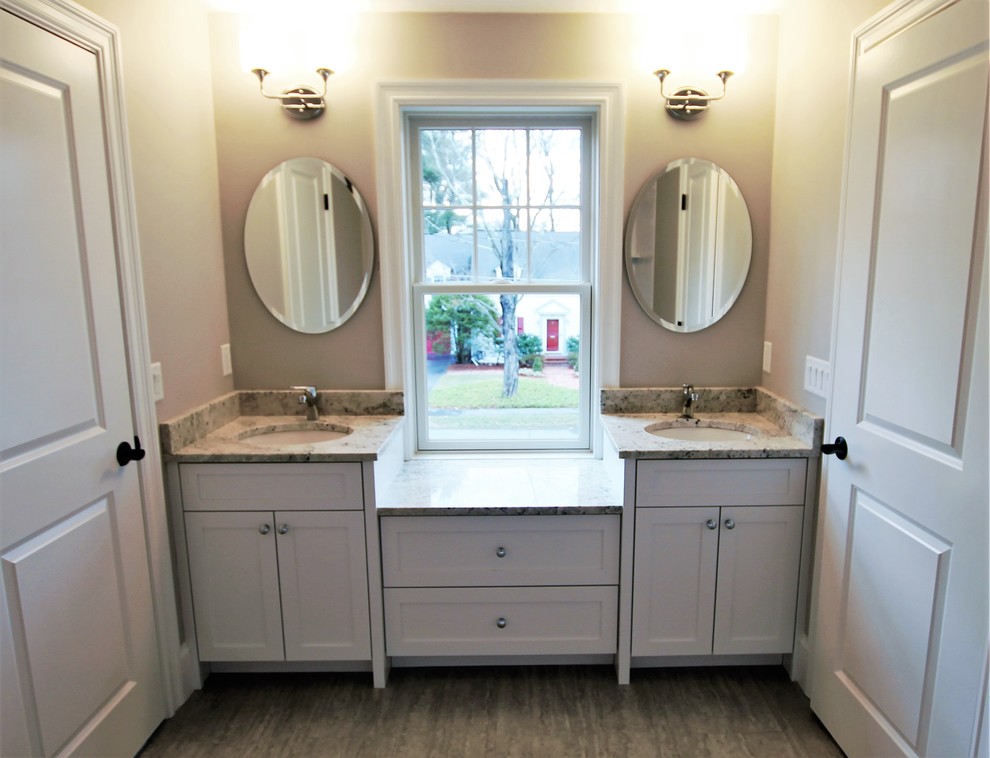Large transitional kids' porcelain tile and beige floor bathroom photo in Boston with shaker cabinets, white cabinets, a two-piece toilet, beige walls, an undermount sink and granite countertops