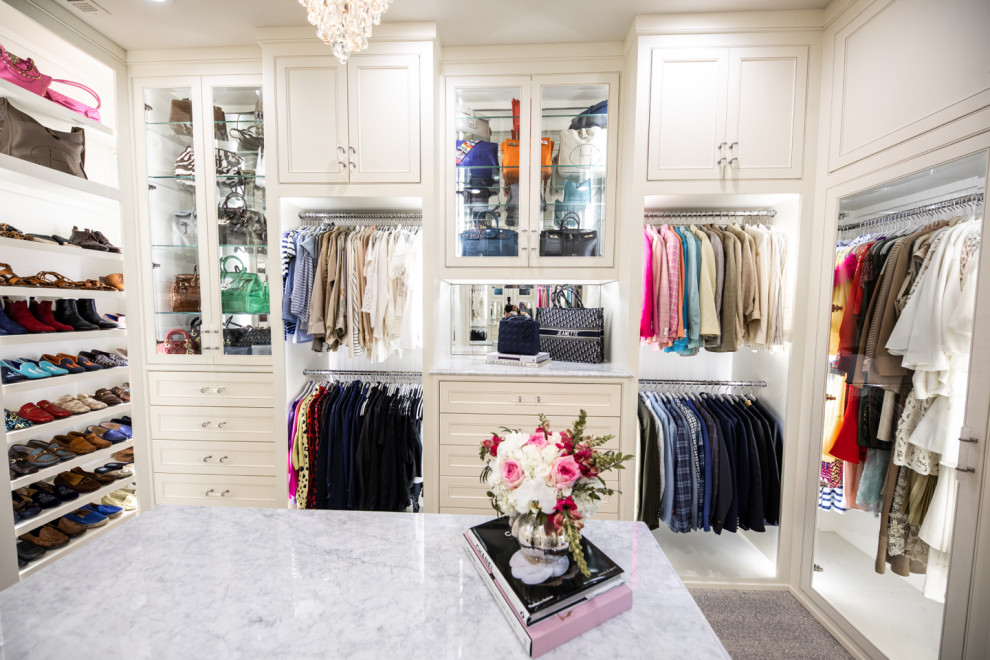 Design ideas for a large traditional women's walk-in wardrobe in Dallas with beaded inset cabinets, white cabinets, carpet and beige floor.