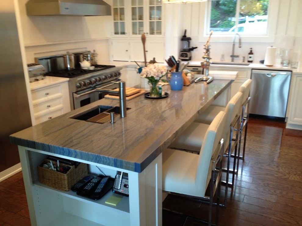 Large transitional l-shaped dark wood floor open concept kitchen photo in Charlotte with an undermount sink, recessed-panel cabinets, white cabinets, marble countertops, white backsplash, subway tile backsplash, stainless steel appliances and an island