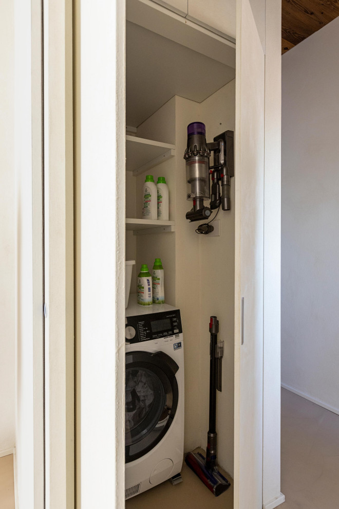 Photo of a scandinavian laundry room in Other.