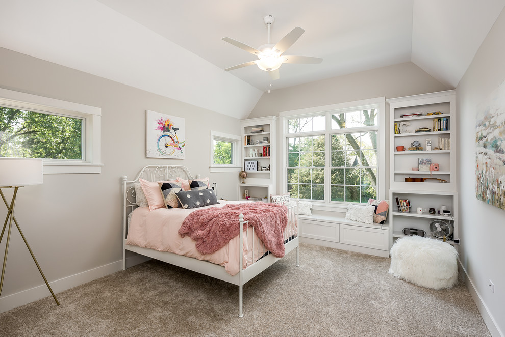 Inspiration for a traditional kids' room for girls in Chicago with grey walls, carpet and beige floor.