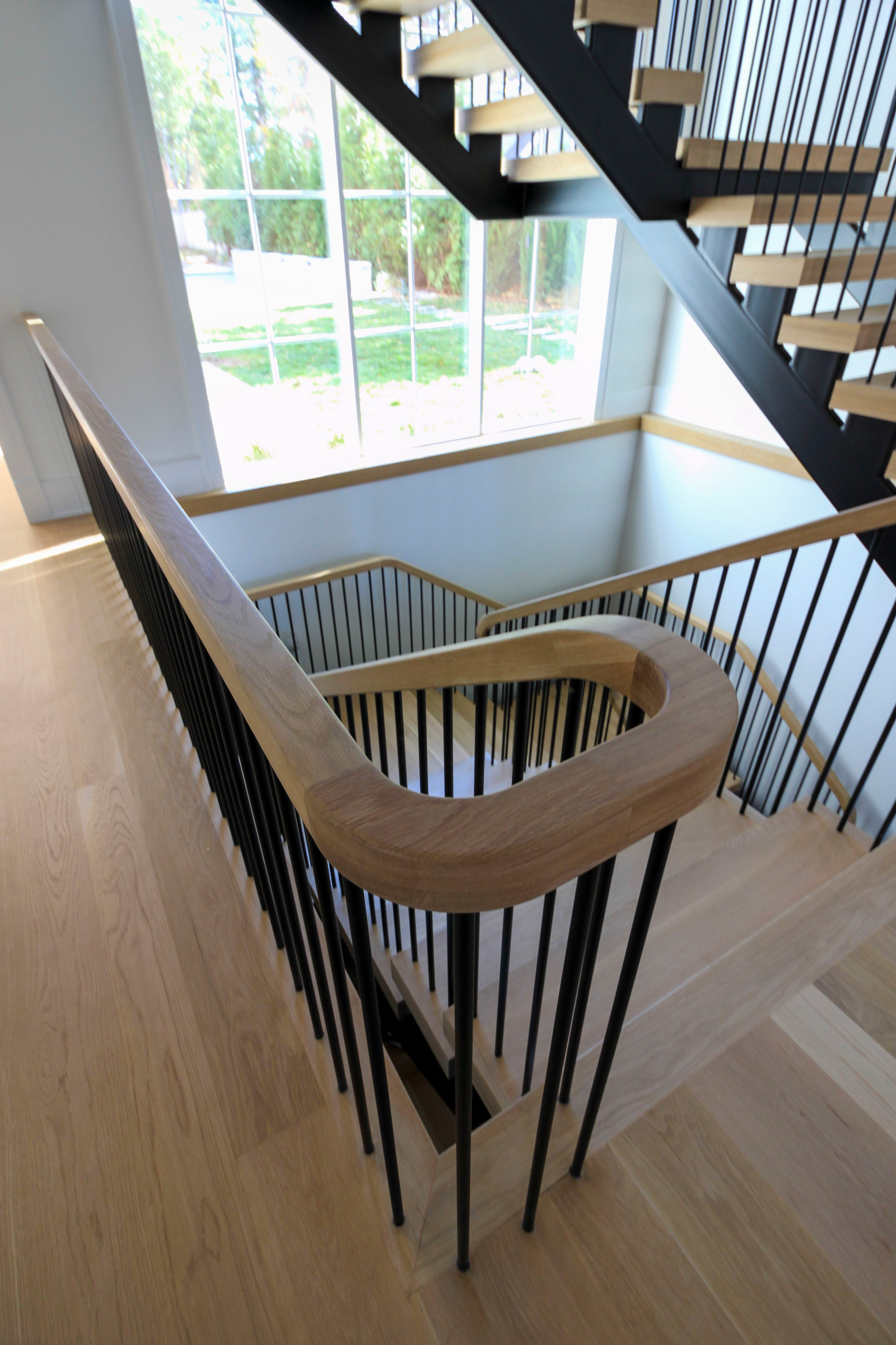 96_Dramatic cantilevered no-riser staircase, Bethesda, MD 20814