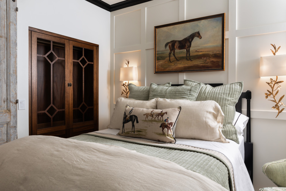 Example of a transitional guest wainscoting bedroom design in Dallas with white walls