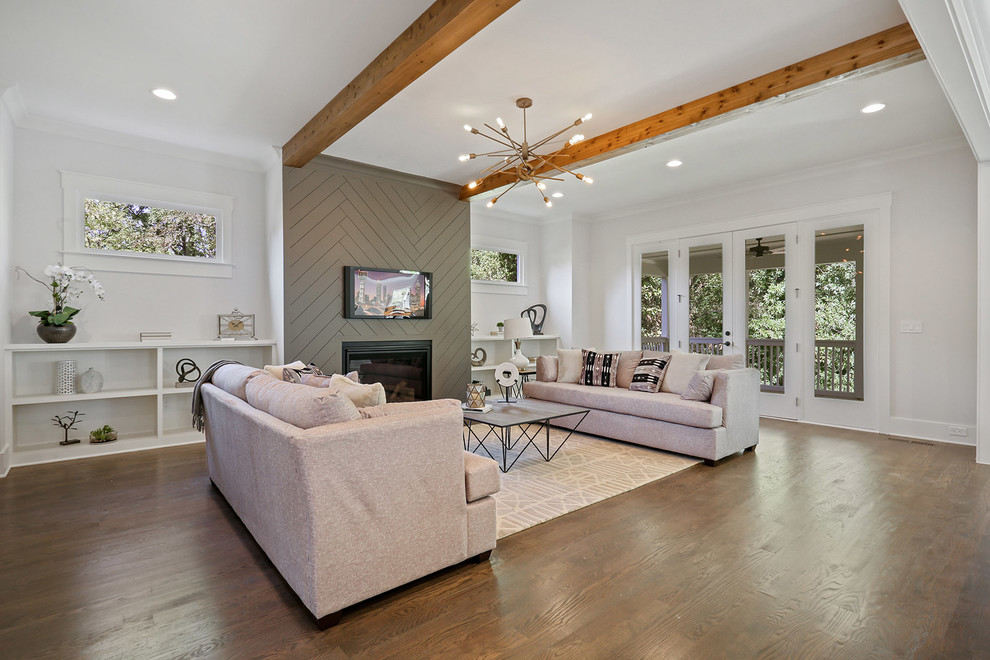 This is an example of a contemporary family room in Atlanta.