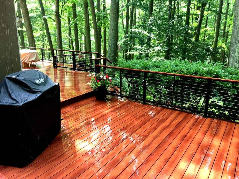 Inspiration for a large contemporary backyard deck in Philadelphia.