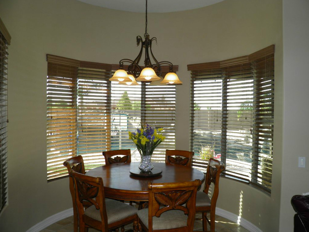 Dining room - dining room idea in Phoenix with beige walls