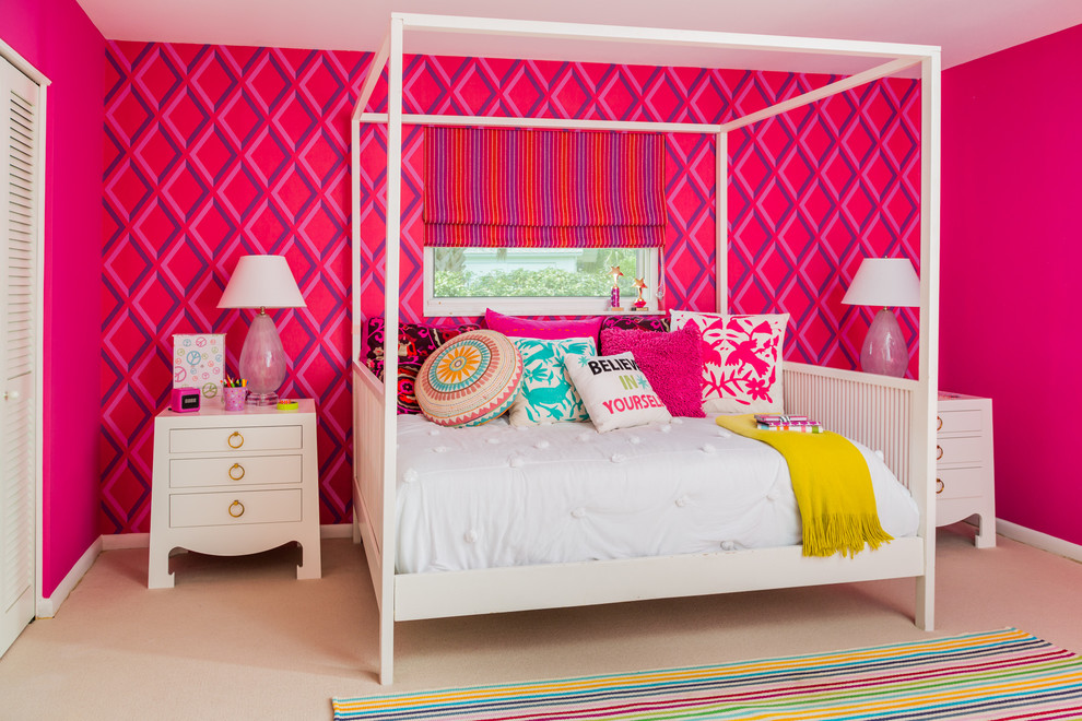 Design ideas for a beach style kids' bedroom for girls in Jacksonville with pink walls and carpet.