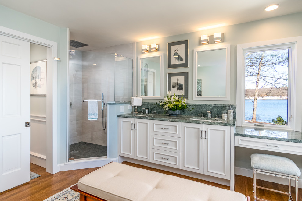 Mid-sized transitional master bathroom in Other with white cabinets, white tile, ceramic tile, granite benchtops, an alcove tub, a corner shower, green walls, an undermount sink, a hinged shower door, recessed-panel cabinets, medium hardwood floors, brown floor and green benchtops.