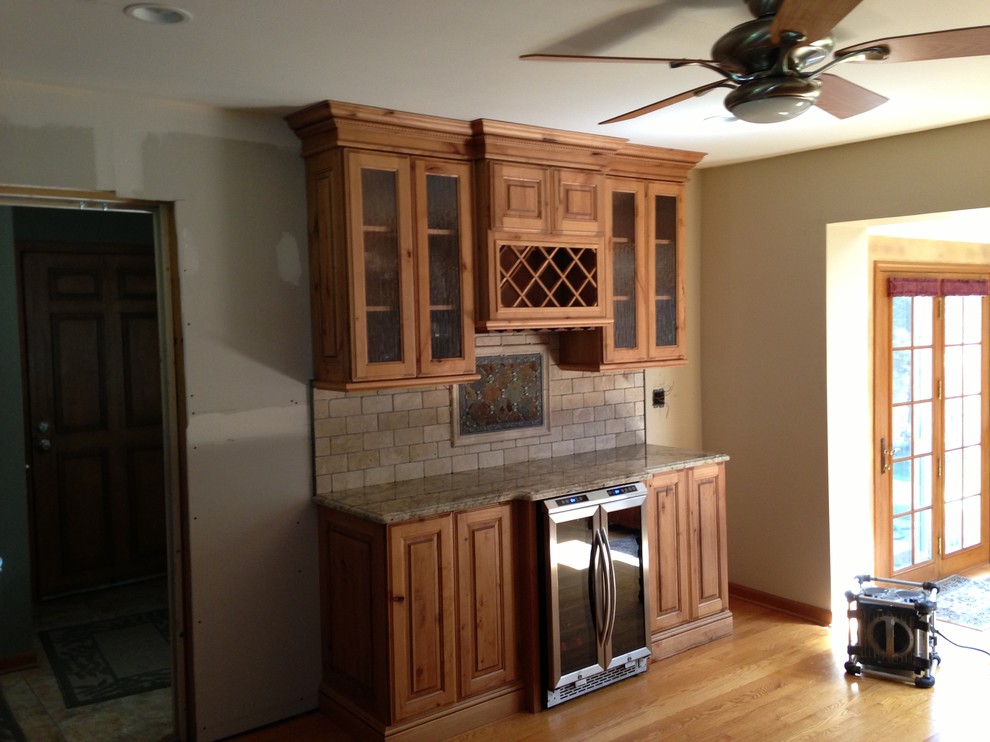 Example of a large mountain style kitchen design in Chicago