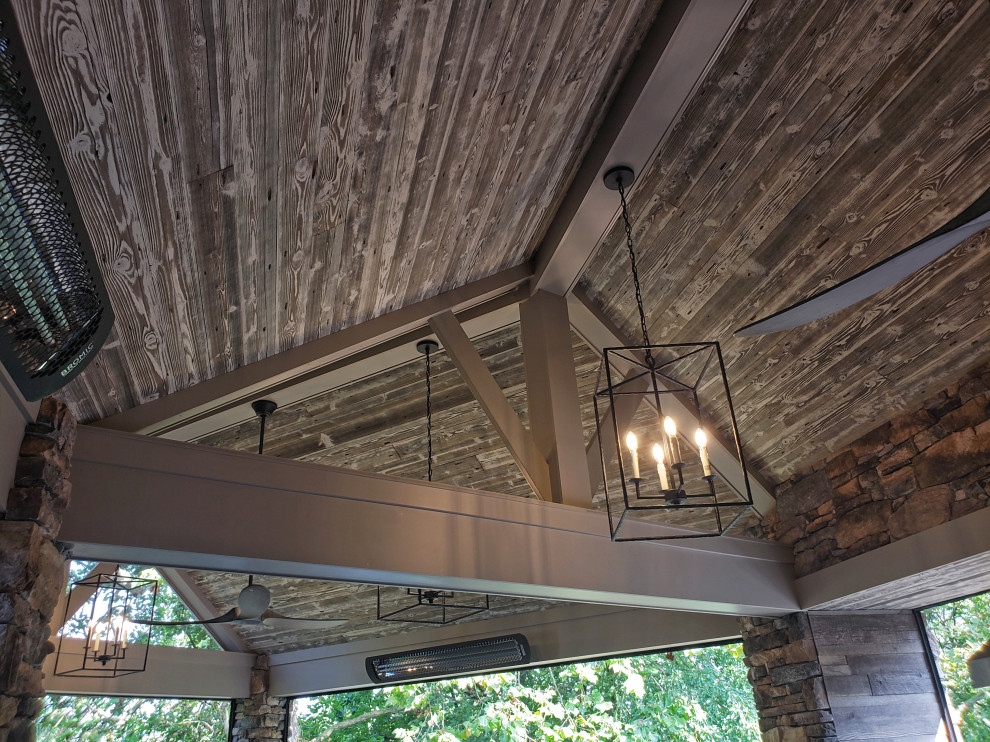 Inspiration for a transitional backyard second story metal railing deck remodel