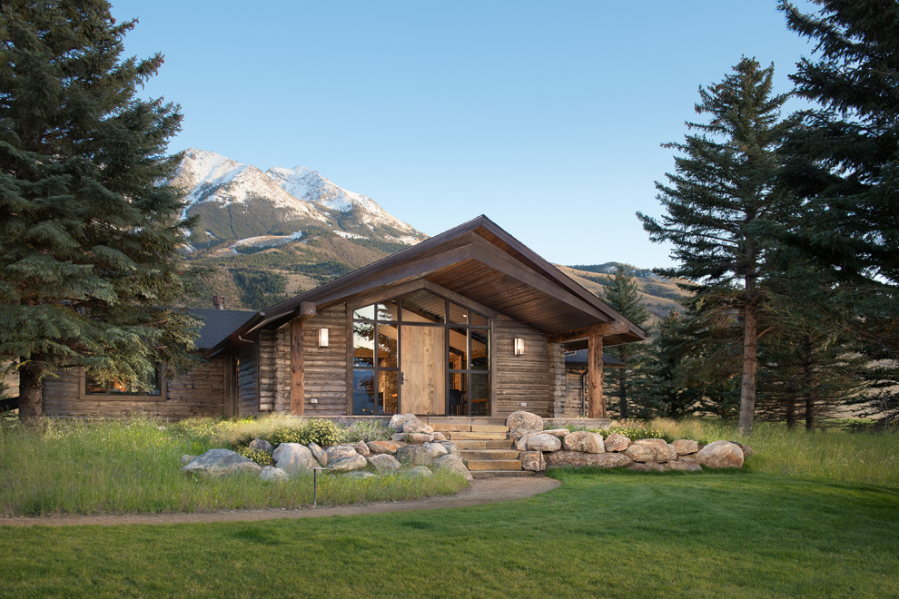 Large mountain style exterior home photo in Other