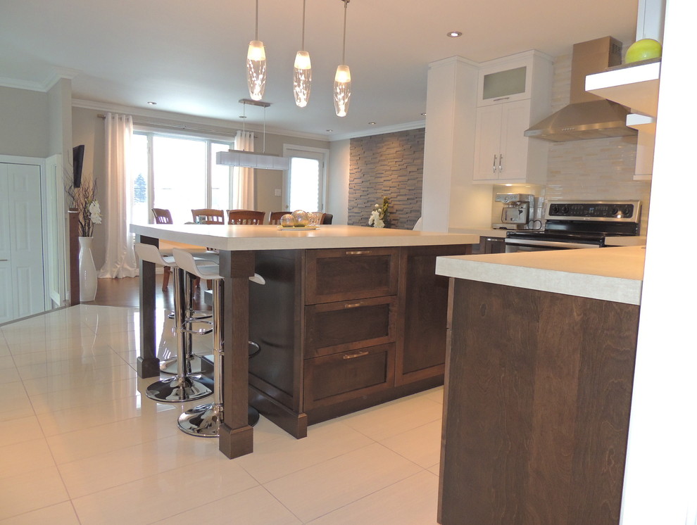Mid-sized transitional porcelain tile and beige floor kitchen photo with a drop-in sink, shaker cabinets, white cabinets, laminate countertops, beige backsplash, subway tile backsplash, stainless steel appliances and an island