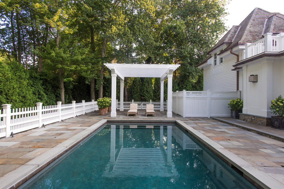 Inspiration for a large traditional rectangular pool in New York.
