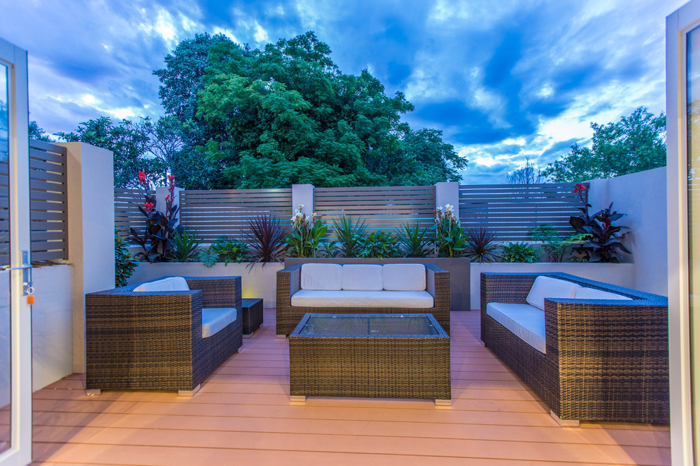 Photo of a small modern courtyard patio in Perth with decking.