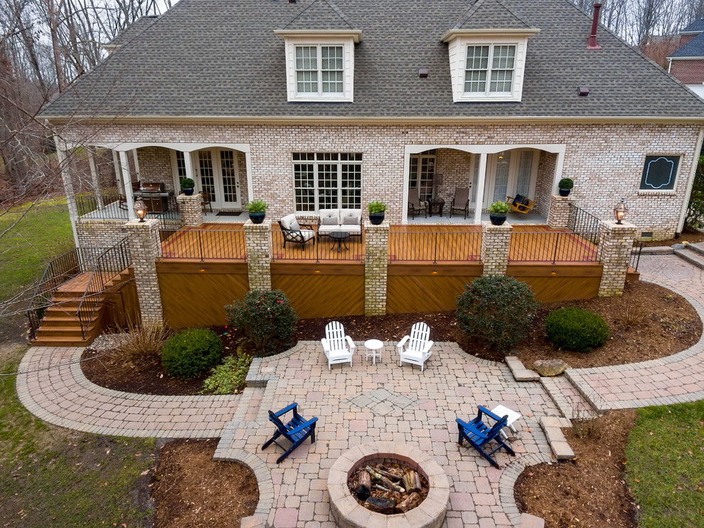 Deck - large transitional backyard deck idea with a fire pit and no cover