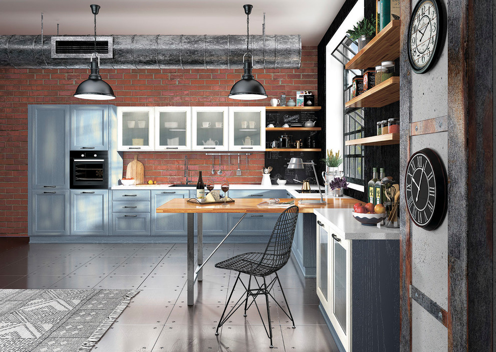 Inspiration for a large industrial l-shaped eat-in kitchen in Moscow with a drop-in sink, shaker cabinets, blue cabinets, wood benchtops, brown splashback, brick splashback, coloured appliances, ceramic floors and with island.