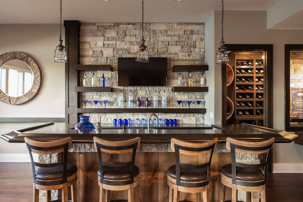 This is an example of a transitional home bar in Kansas City.