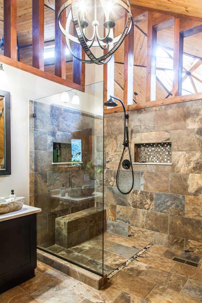 Example of a mid-sized mountain style master multicolored tile and porcelain tile porcelain tile and multicolored floor freestanding bathtub design with a vessel sink, shaker cabinets, quartz countertops, a one-piece toilet, gray walls and dark wood cabinets