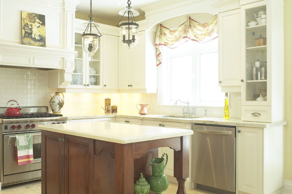 This is an example of a small traditional u-shaped separate kitchen in Toronto with an undermount sink, flat-panel cabinets, white cabinets, granite benchtops, yellow splashback, subway tile splashback, stainless steel appliances, marble floors and with island.
